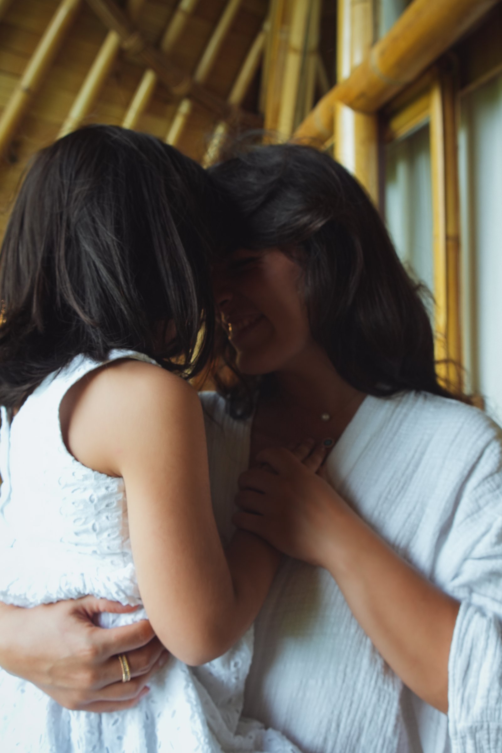 Tima Rasekh holding her daughter